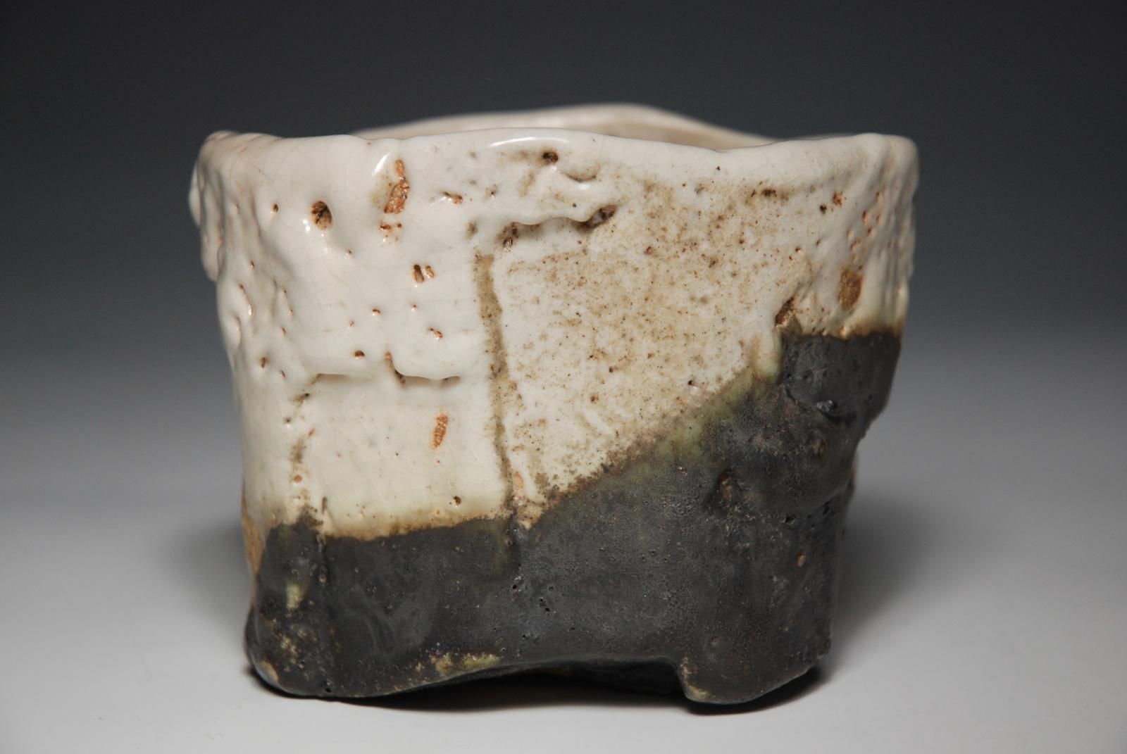 Coiled Stoneware Chawan. Decorated with  Black Oribe and White Glazes.  Fired in a Wood Fired Kiln. by Jeff Shapiro