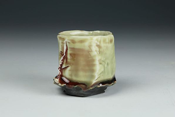 Eddie Curtis - Porcelain kurinuki sake cup with celadon and copper oxide