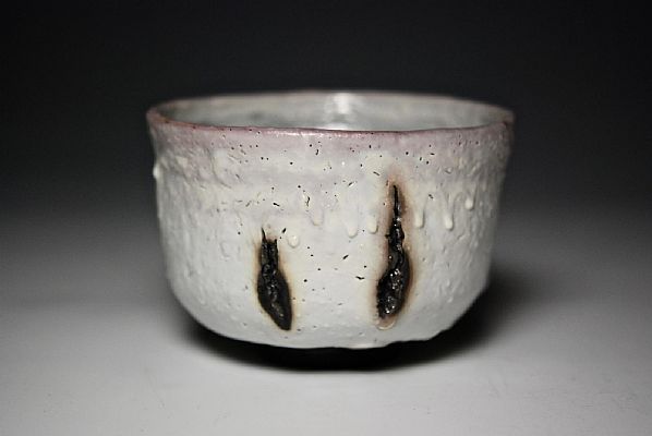 Margaret Curtis - Thrown and altered Chawan, using black stoneware and white s...