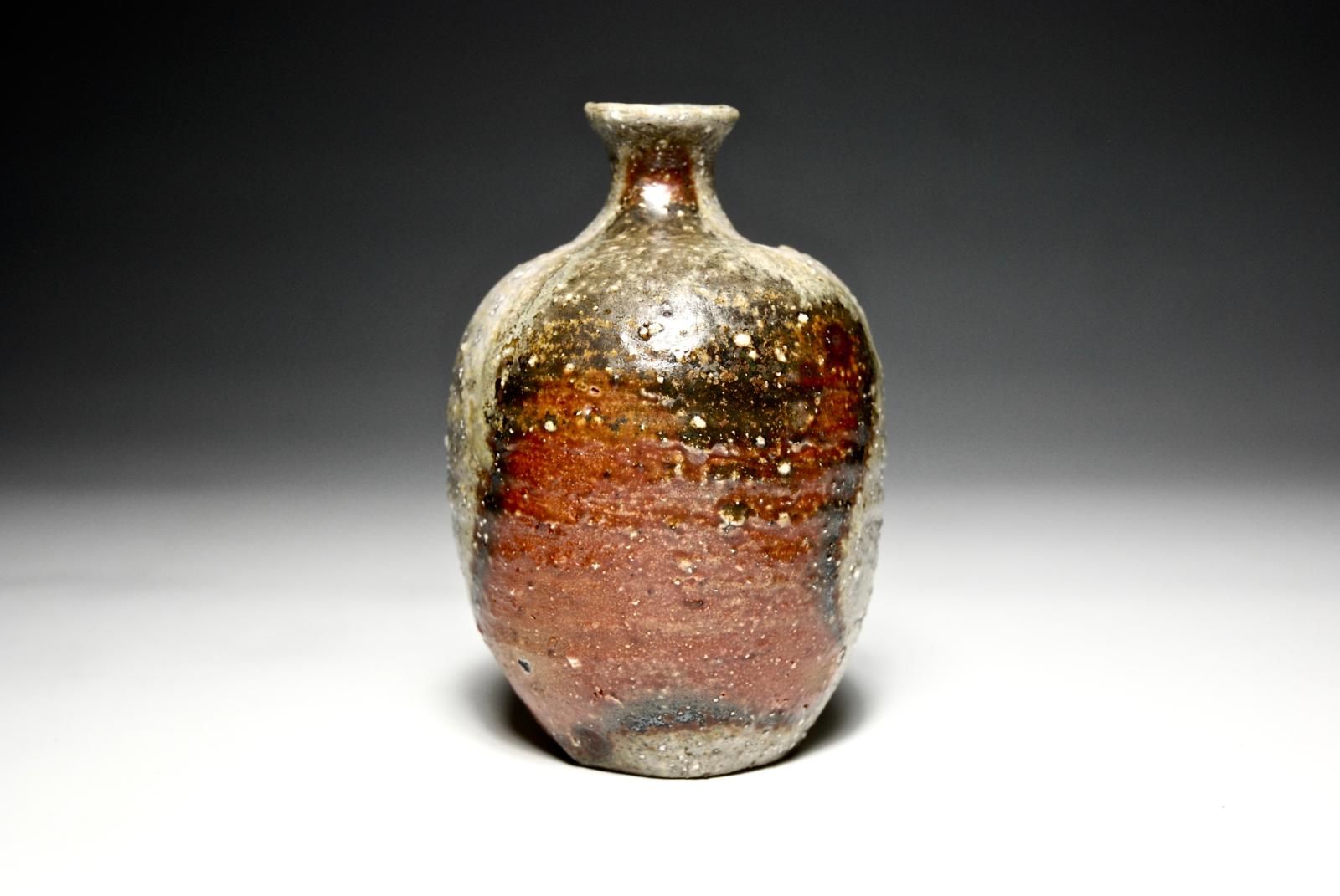 Sake bottle, natural grey ash deposit, stoneware, 7 days Anagama firing by Uwe Löllmann