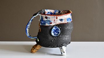 Tall footed mug by Aaron Scythe