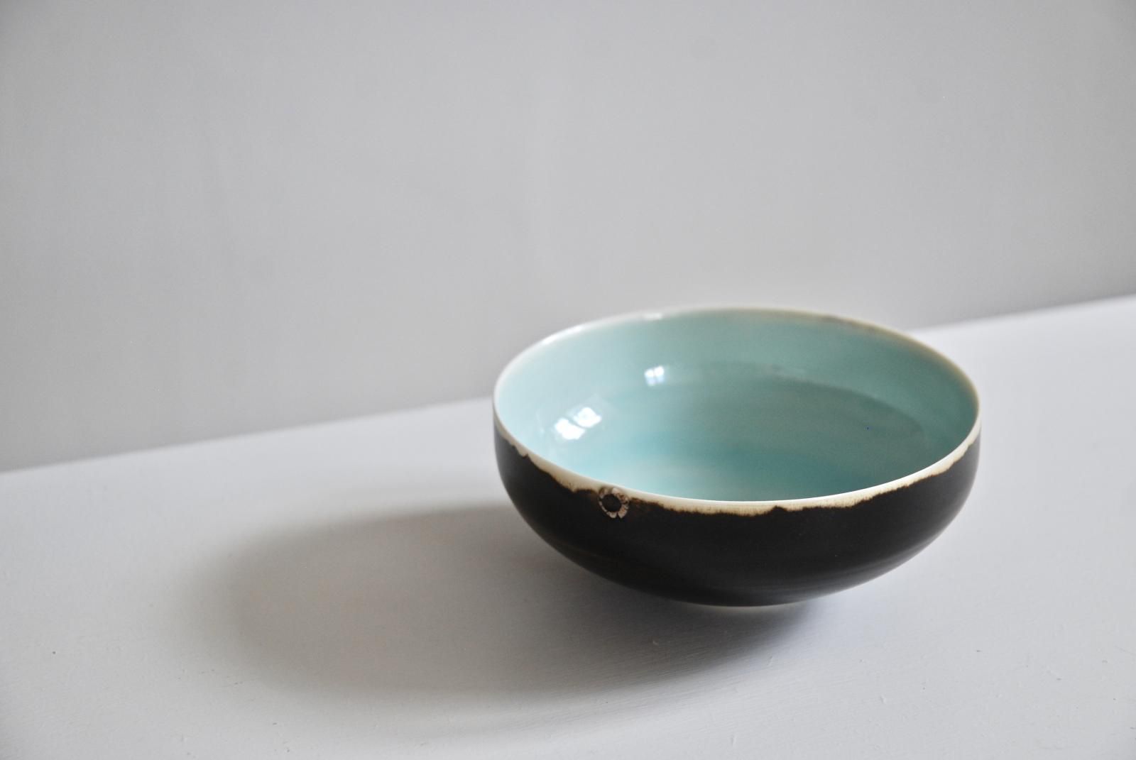 Small lugged bowl with tenmoku exterior & duck egg blue interior glaze by Peter Wills
