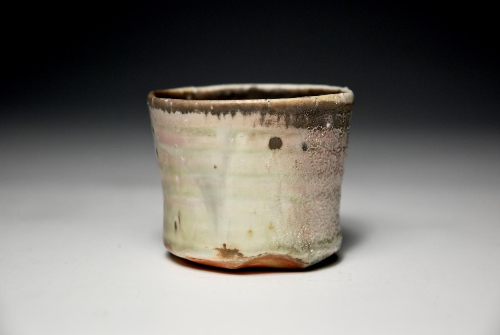 Petit Cup.  Individual Slow Thrown with Hand Trimmed Foot.  Porcelain with Locally SOurced Indigenous Rock Grits.  Celadon Glaze. by Sim Taylor