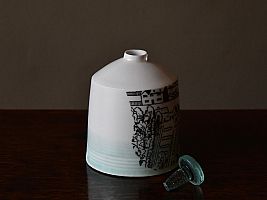 Mudlarking Bottle.  Porcelain with glass stopper found on the Thames Foreshore.  Ceramic transfer fragment from the London Agas Map 1565 by Raewyn Harrison